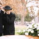 Image for article titled Person Standing Far Away From Burial Must Have Deep, Dark Secret About Deceased